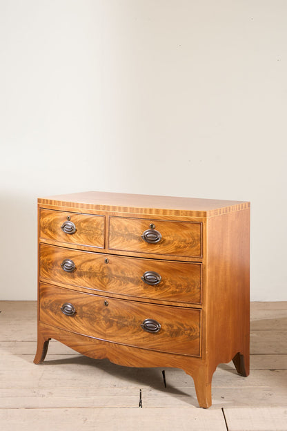 Early 20th century Bow fronted mahogany chest of drawers