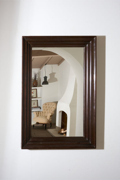 Unusual 20th century African hardwood moulded mirror