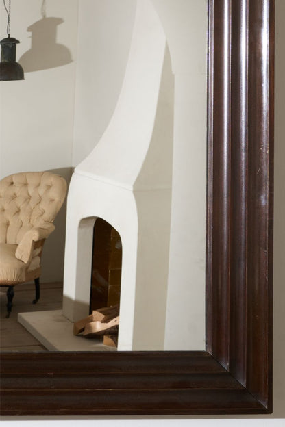 Unusual 20th century African hardwood moulded mirror