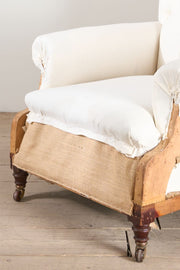 Large proportioned 19th century buttoned back armchair by Hamptons and sons - TallBoy Interiors