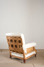 Large proportioned 19th century buttoned back armchair by Hamptons and sons - TallBoy Interiors