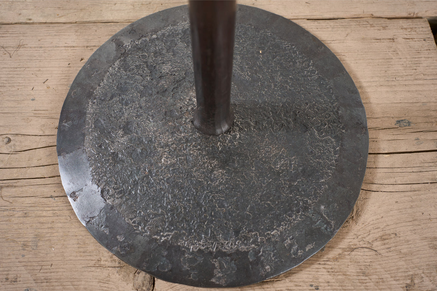 The 'Brokkr' forged steel martini table with quartzite top