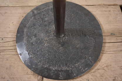 The 'Brokkr' forged steel martini table with quartzite top