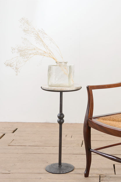 The 'Brokkr' forged steel martini table with quartzite top