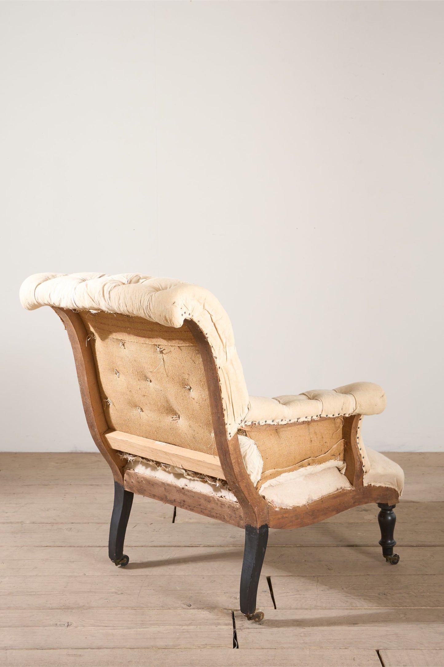 Napoleon III Buttoned scroll back armchair