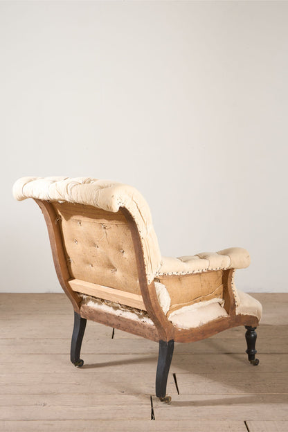 Napoleon III Buttoned scroll back armchair