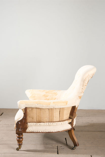 Early Victorian buttoned back country house armchair