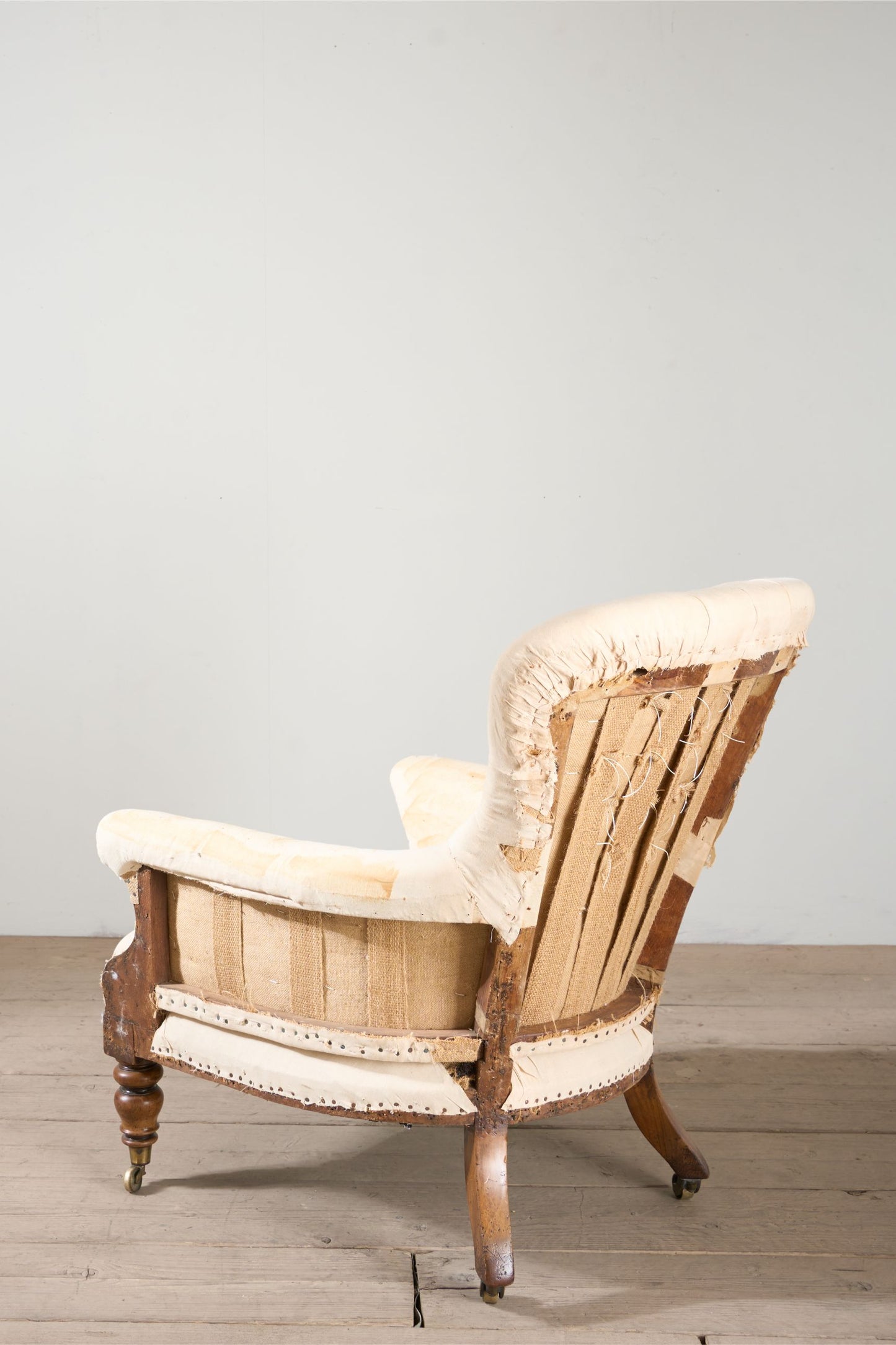 Early Victorian buttoned back country house armchair