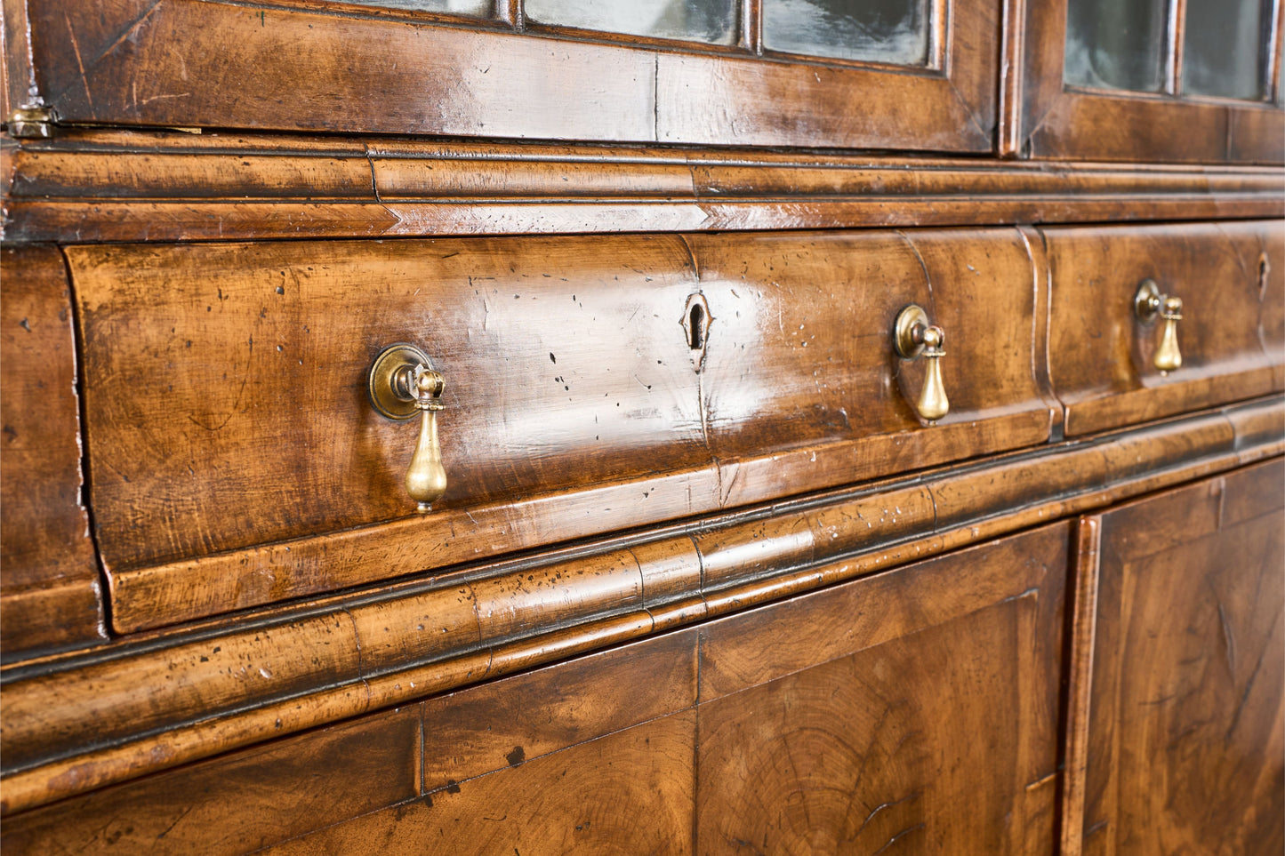 19th century George I style double arched walnut cabinet