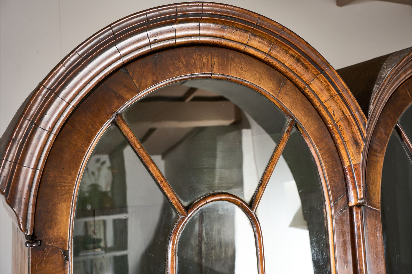 19th century George I style double arched walnut cabinet