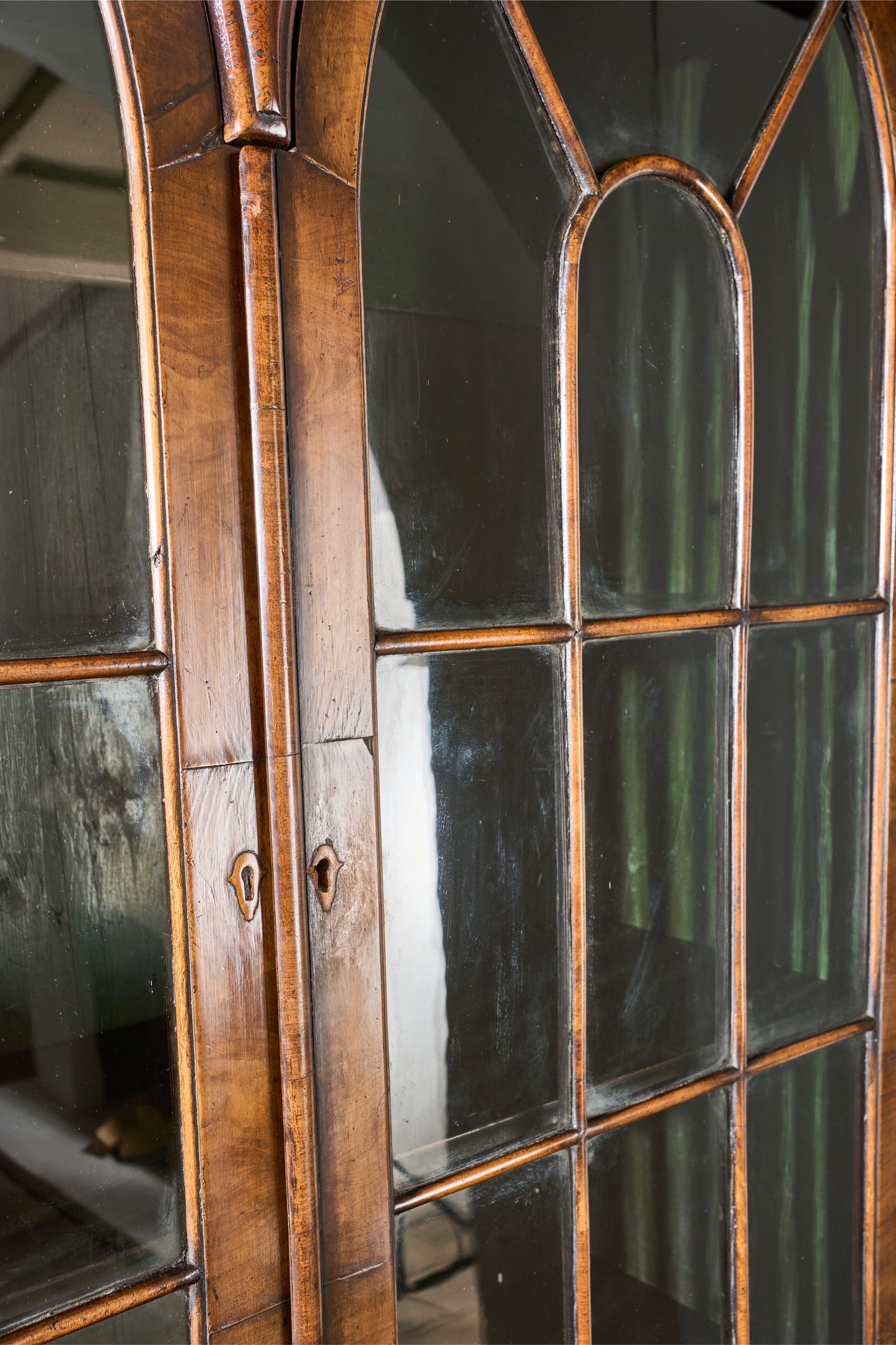 19th century George I style double arched walnut cabinet