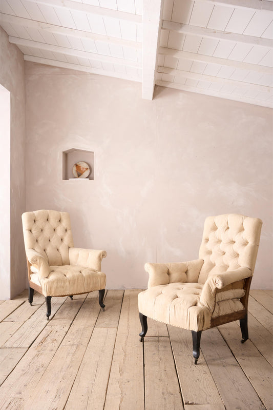 Pair of Napoleon III buttoned back and seat armchairs