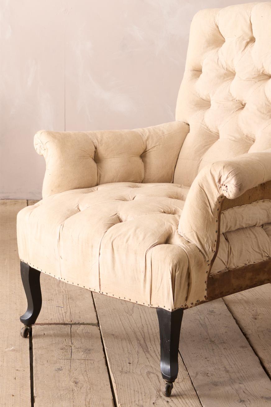 Pair of Napoleon III buttoned back and seat armchairs