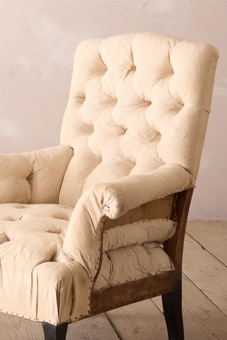 Pair of Napoleon III buttoned back and seat armchairs