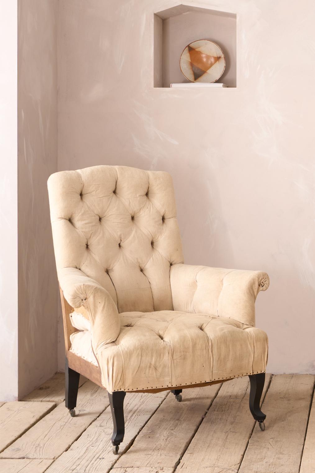 Pair of Napoleon III buttoned back and seat armchairs