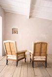 Pair of Napoleon III buttoned back and seat armchairs