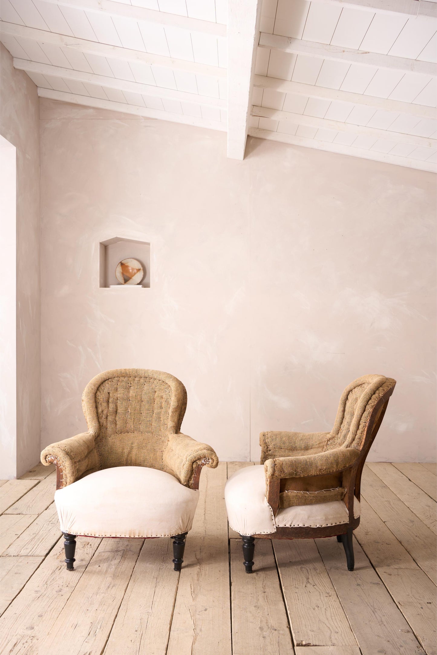 Pair of Napoleon III curved hessian back armchairs