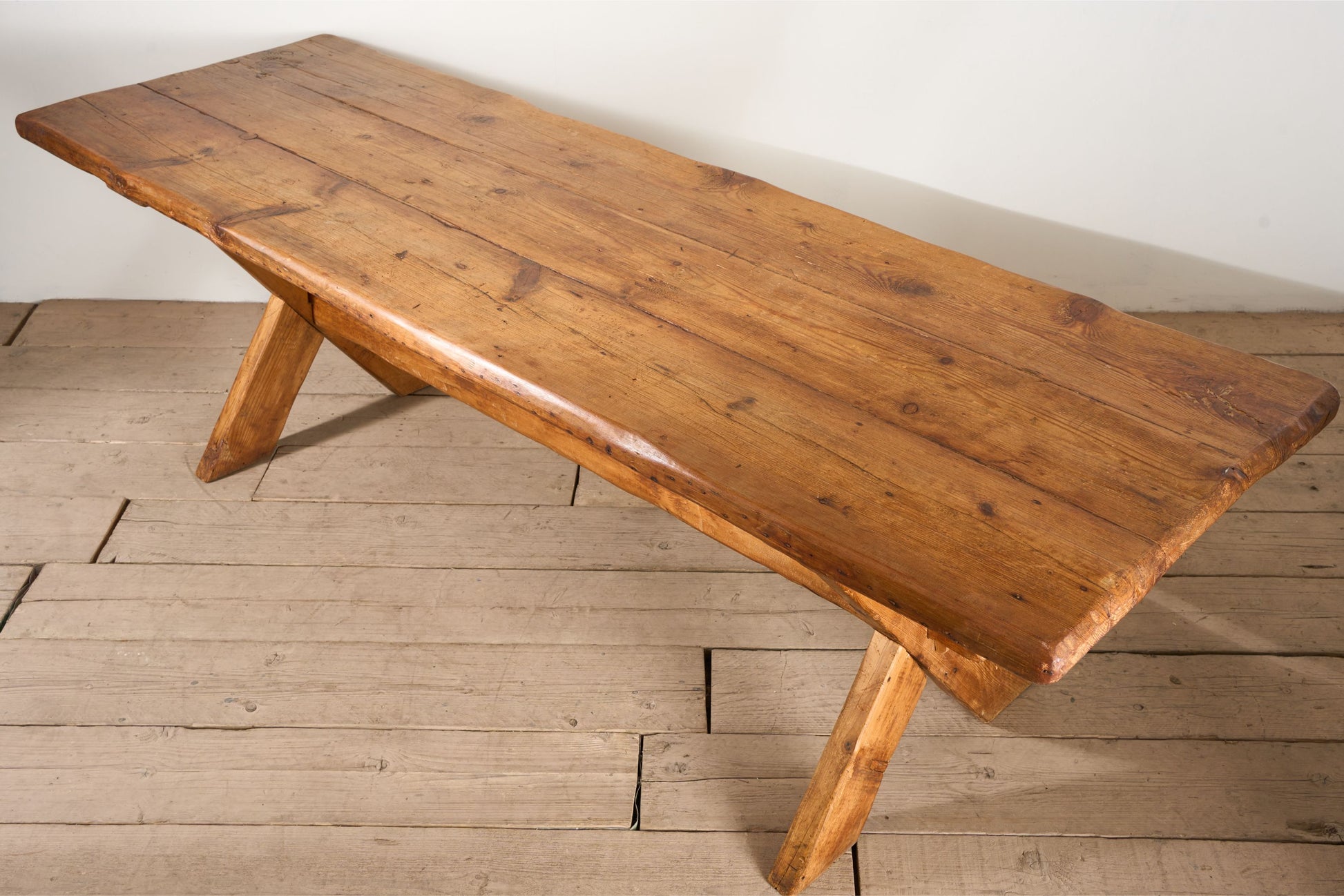 19th Century waney edged pine X frame tavern table - TallBoy Interiors