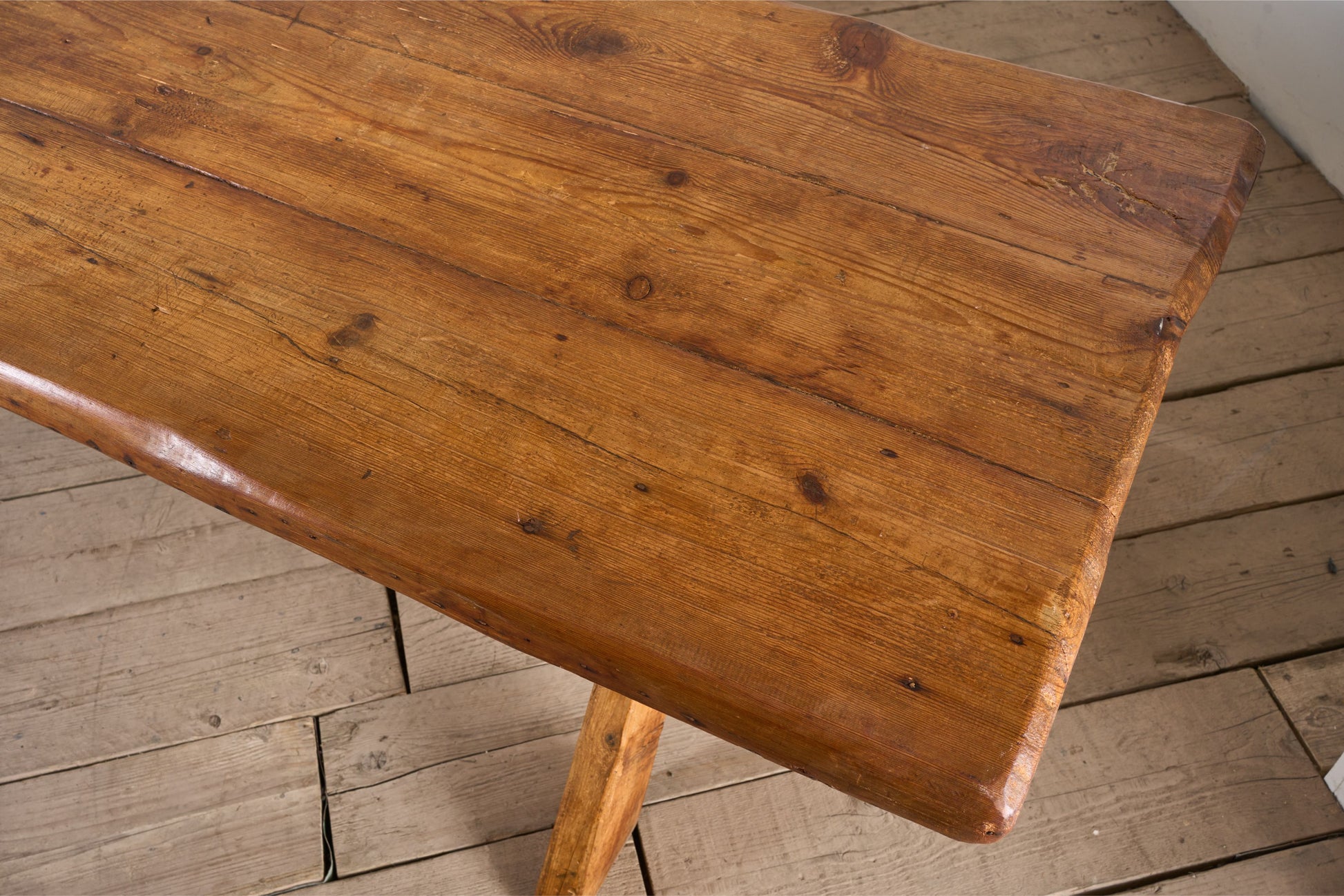 19th Century waney edged pine X frame tavern table - TallBoy Interiors