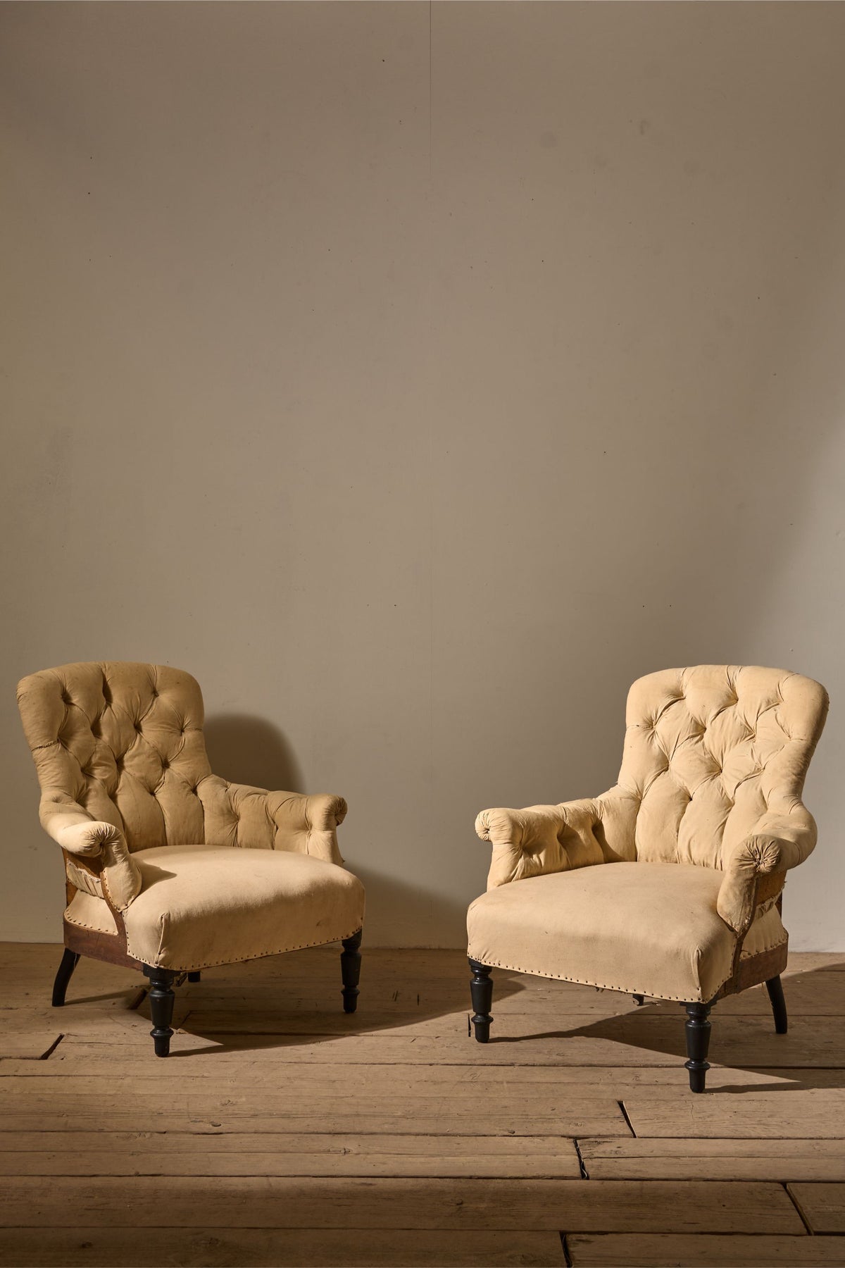 Pair of Napoleon III Buttoned curved back armchairs - TallBoy Interiors