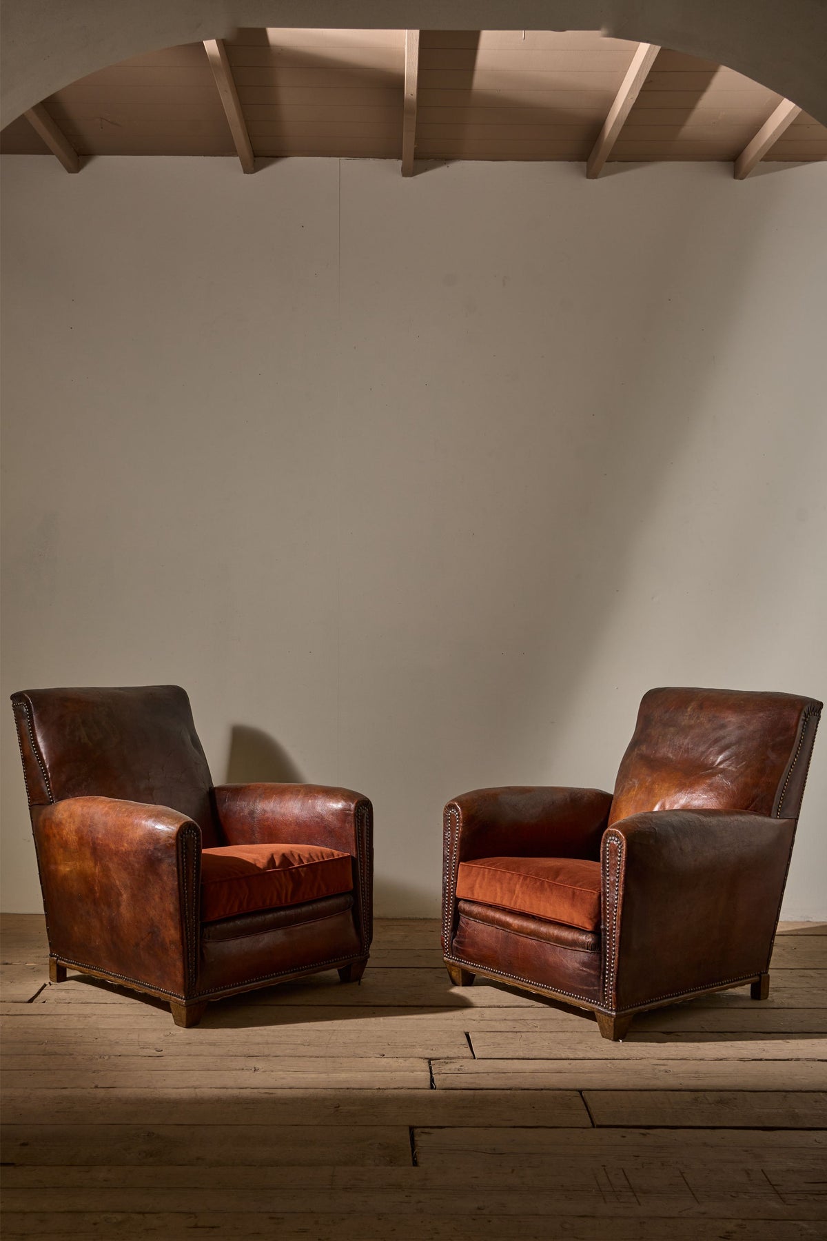 Pair of early 20th century leather club chairs - TallBoy Interiors