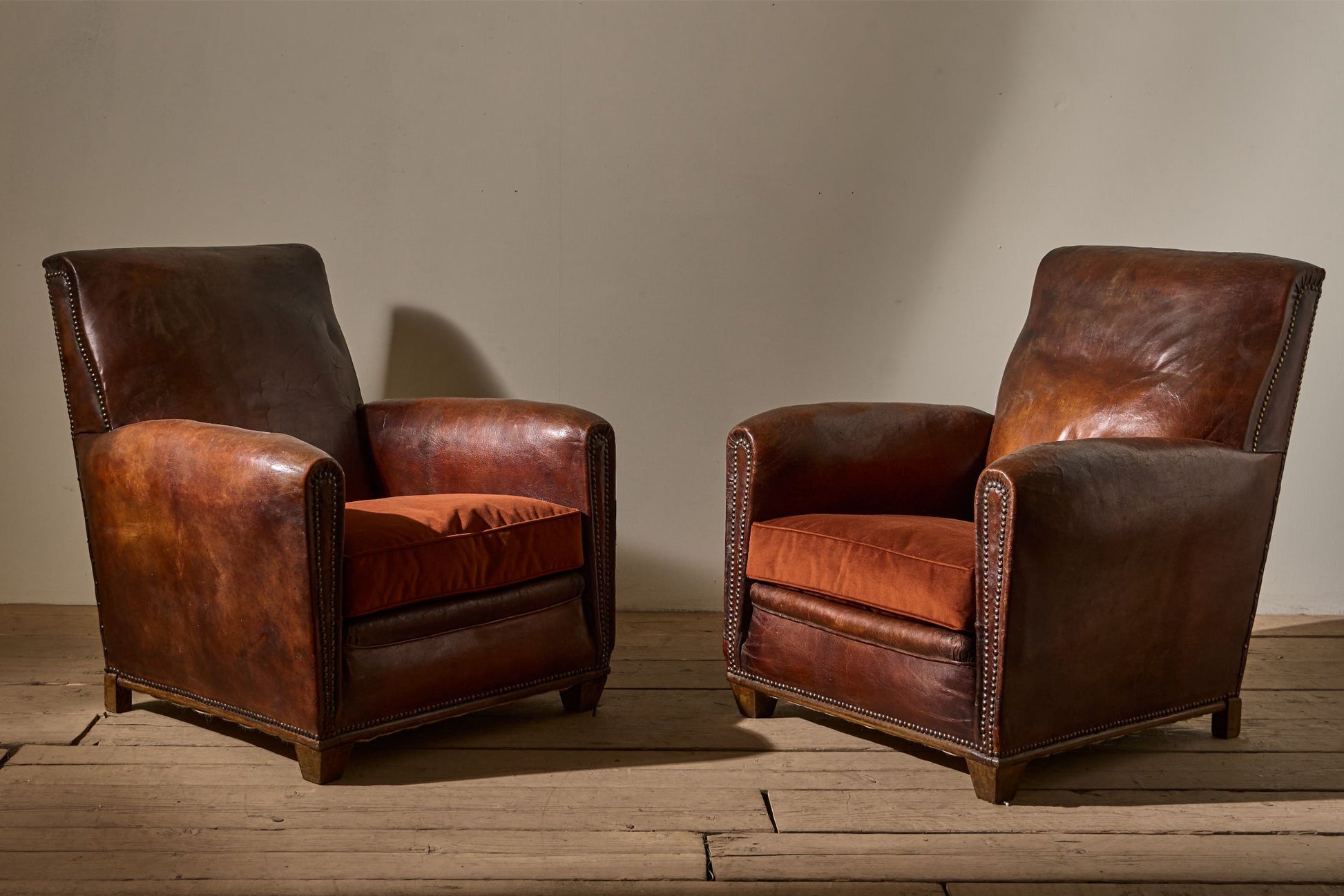 Pair of early 20th century leather club chairs - TallBoy Interiors