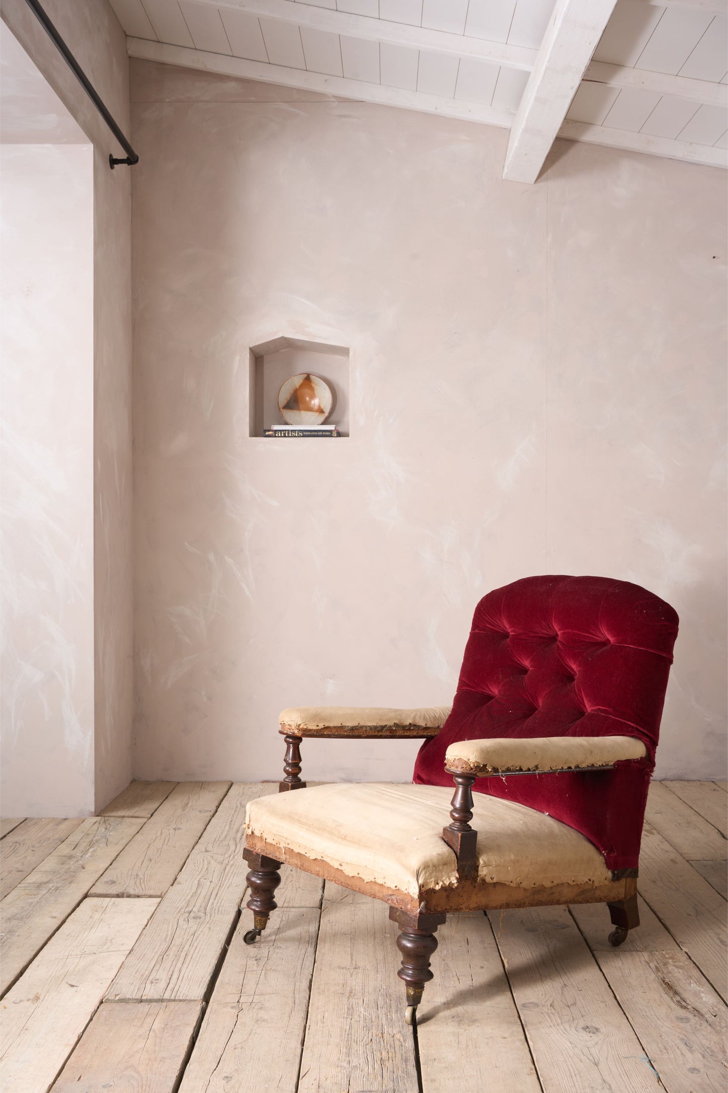 19th century buttoned back open armchair