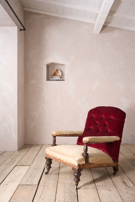 19th century buttoned back open armchair