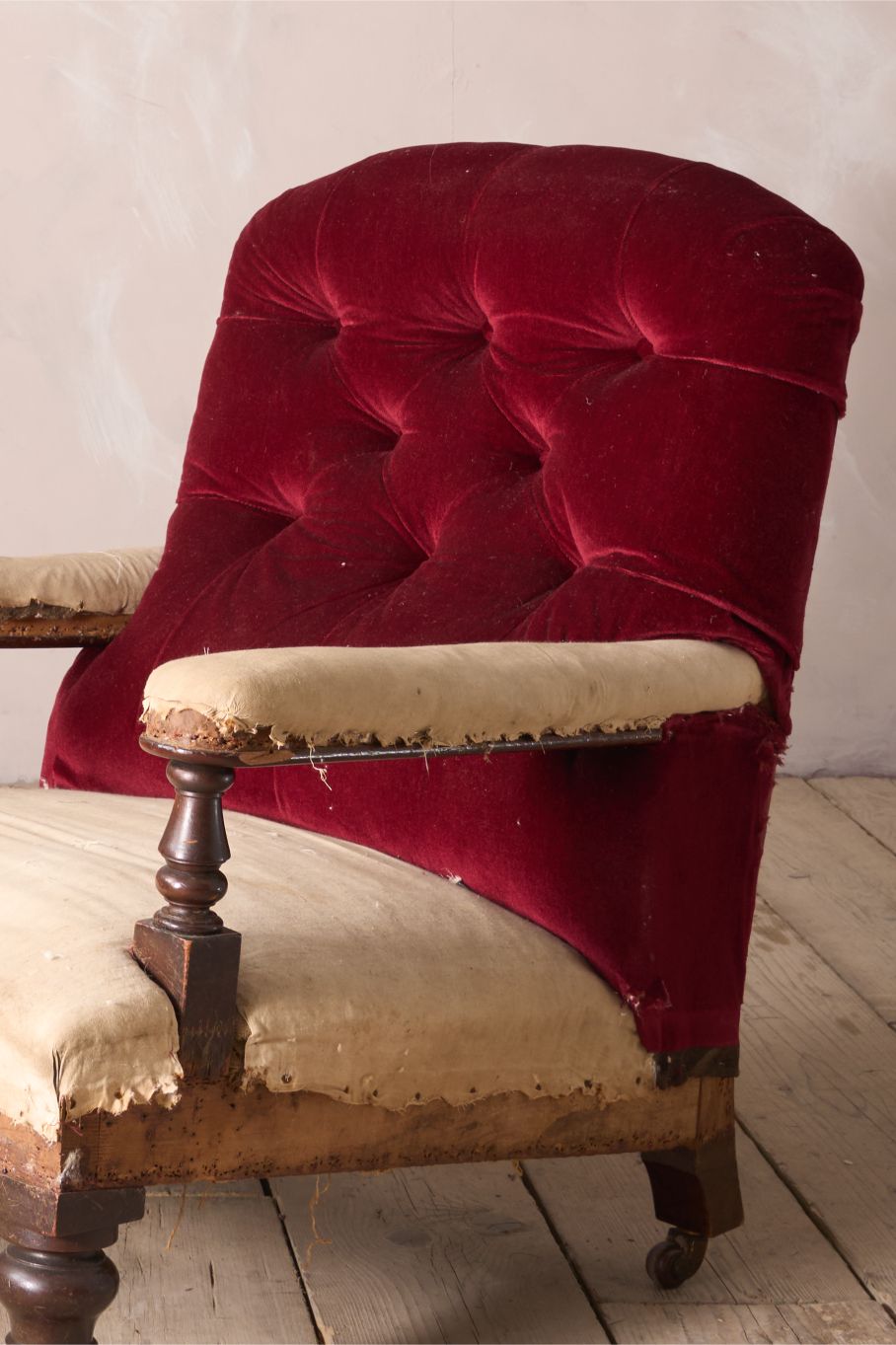19th century buttoned back open armchair