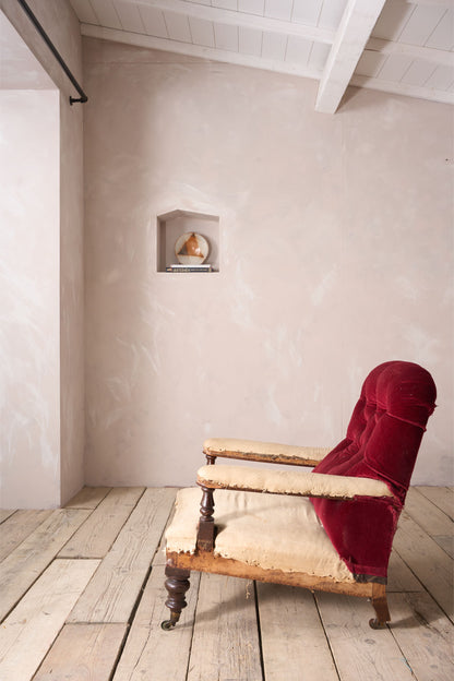 19th century buttoned back open armchair
