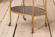 1930's Black leather and brass two tiered drinks table