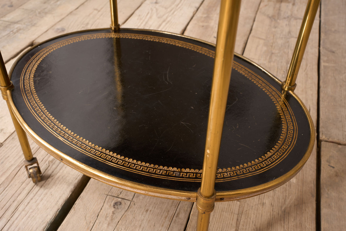 1930's Black leather and brass two tiered drinks table