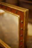Mid 20th century Red and gilt studded mirror - TallBoy Interiors