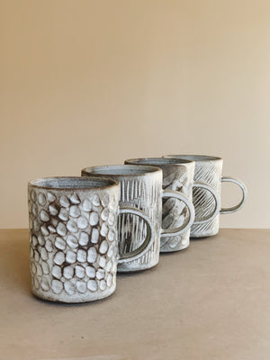 Matte white hand carved mug By Eren