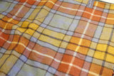 Recycled Wool Waterproof Picnic Blanket in orange tartan