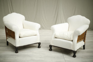 Antique pair of c.1900 country house armchairs with claw feet