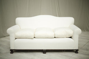 Antique c.1900 English country house sofa with claw feet