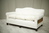 Antique c.1900 English country house sofa with claw feet