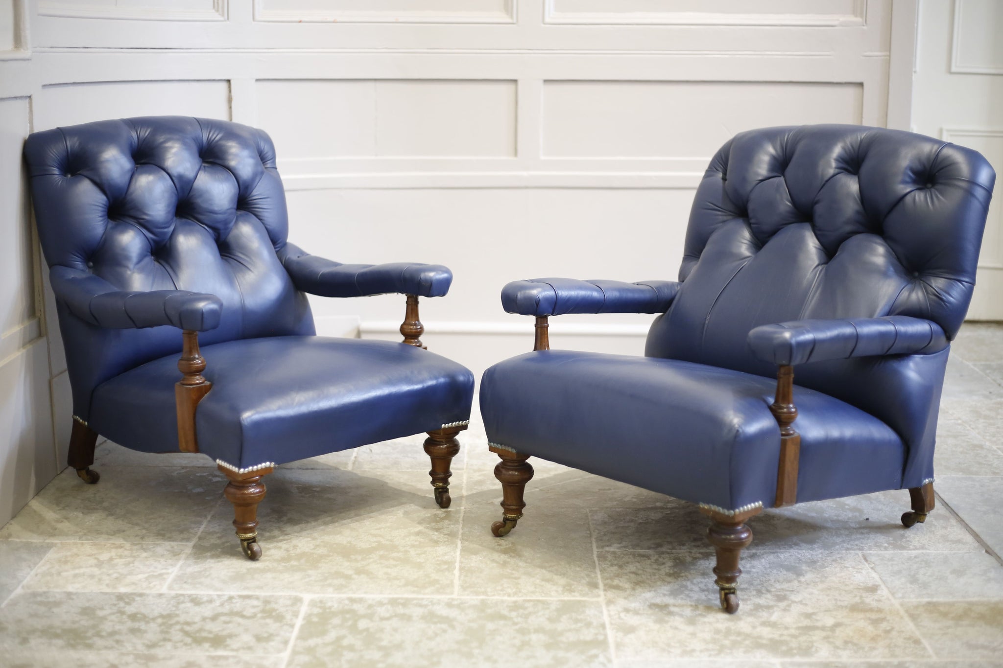 Pair of Victorian his and hers Leather open armed armchairs - TallBoy Interiors