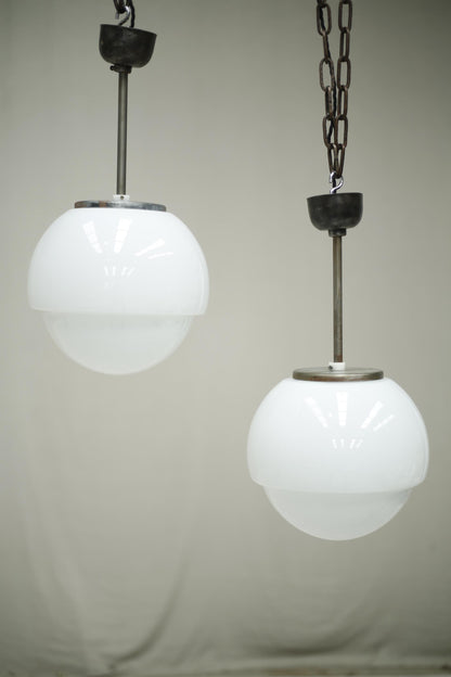 Run of 8 mid 20th century opaline pendant lights