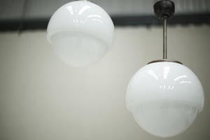 Run of 8 mid 20th century opaline pendant lights