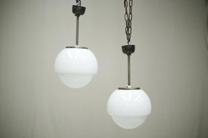 Run of 8 mid 20th century opaline pendant lights