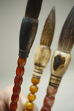 3x 20th century Japanese calligraphy brushes- Amber and stone