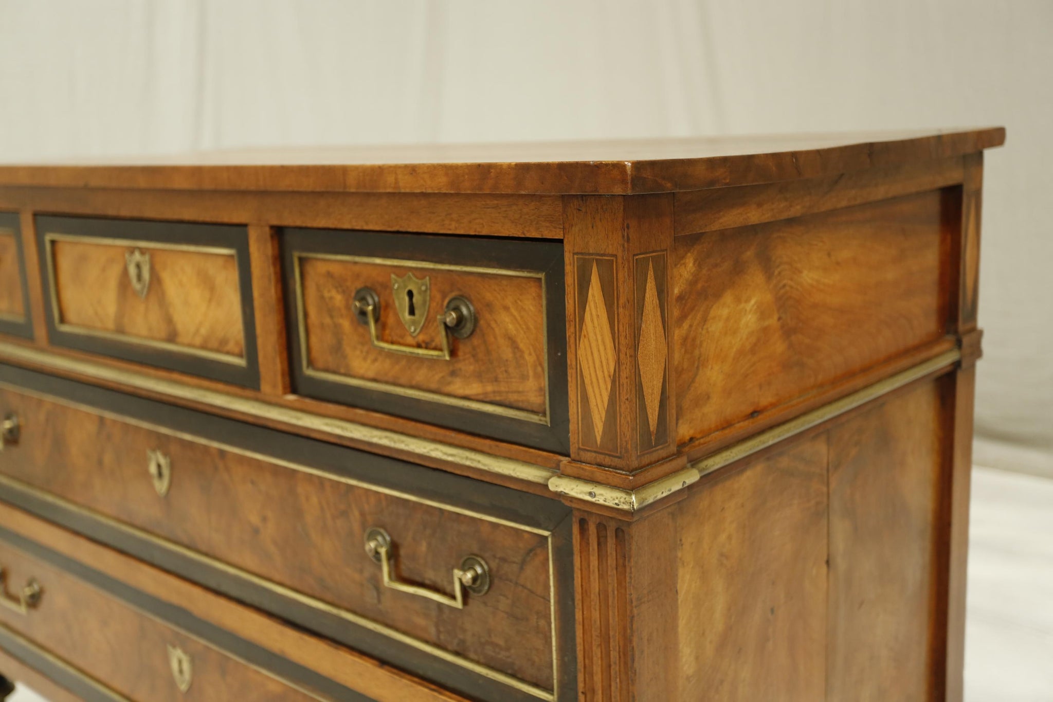 Antique 19th century French walnut and ebony chest of drawers