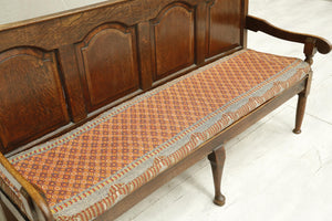 Antique 18th century oak settle with kilim seat cushion