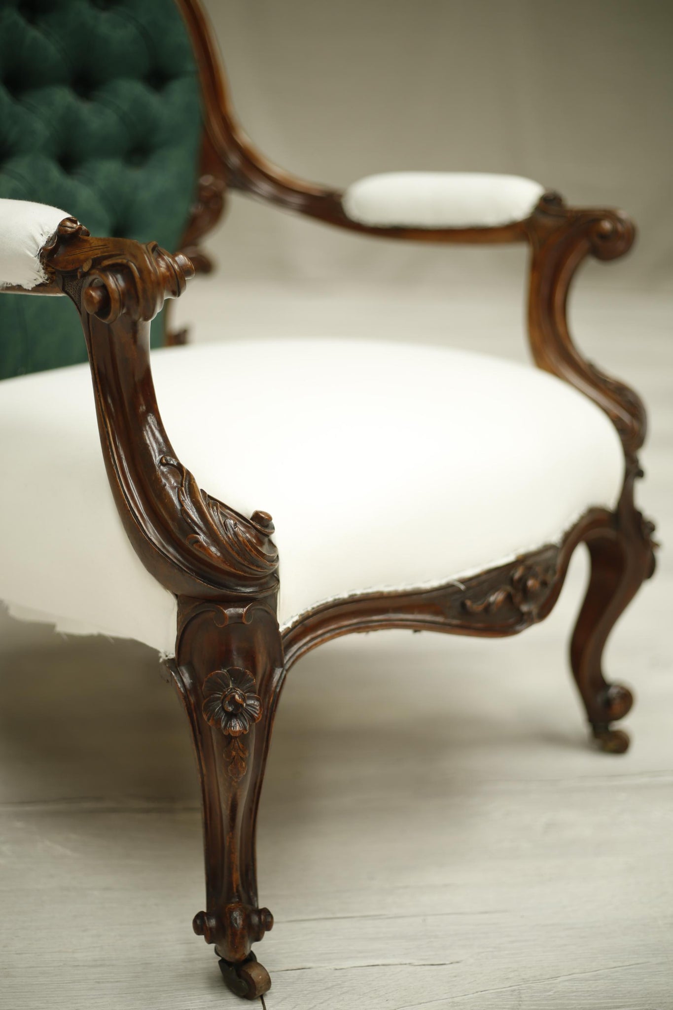 Buttoned Early Victorian carved open armchair - TallBoy Interiors