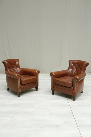 Pair of Antique leather country house armchairs