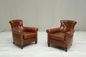 Pair of Antique leather country house armchairs