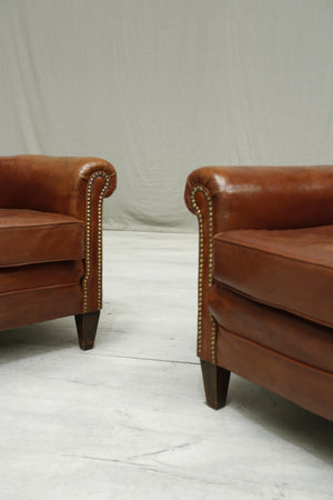 Pair of Antique leather country house armchairs