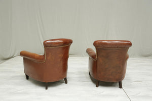 Pair of Antique leather country house armchairs